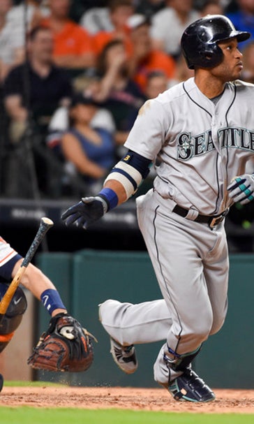 Cano drives in 3 in 9th to give Mariners 6-3 win over Astros